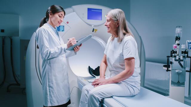 Doctor explaining an imaging procedure to a patient